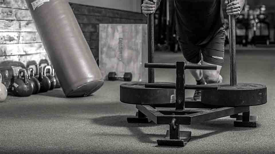 The sled push is an excellent exercise that will work your entire body.